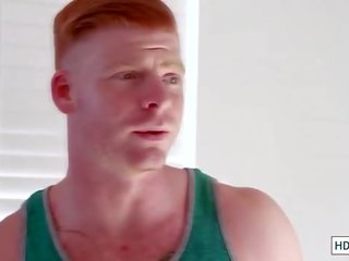 Hard bodied ginger fucked by a hunk
