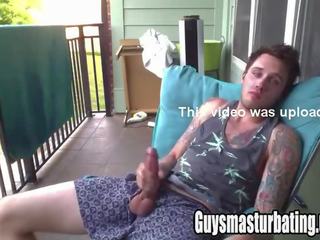 Superior tattooed fellow jerking off on his balcony